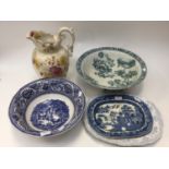An Asiatic Pheasant meat plate; together with a smaller willow pattern plate,
