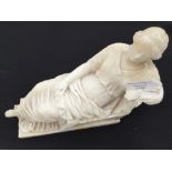 An early 20th Century Italian alabaster study of a reclining classical maiden s/d