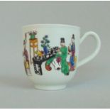 A Worcester Polychrome Coffee Cup Decorated with Mandarin Style figures by a Table Circa 1770-75