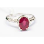 ***PLEASE NOTE AMENDED DESCRIPTION & GUIDE*** An 18ct white gold single stone ruby ring with