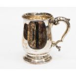 A silver tankard, Sheffield , 1947 Poston Products Ltd, engraved as a presentation gift, dated 1948,