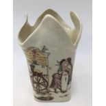 A Sarreguemines, circa 1910 vase with children and games motifs, a cupid emblem,