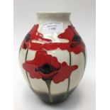 A Moorcroft vase in the 'Blue Heaven' pattern in a different colourway designed by Nicola Slaney,