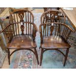 A set of eight 20th Century Windsor chairs, traditionally made, with arched back rails,