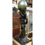 A European Art Nouveau bronzed floor standing lamp,