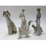 A Lladro figure of an Afghan hound; together with similar of a lady with an Afghan hound,