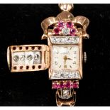 A 14kt rose gold ruby and diamond cocktail wristwatch, the Swiss made watch by Tirza,