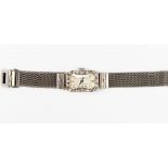 ***PLEASE NOTE AMENDED GUIDE PRICE*** A Belle Epoque diamond set platinum cocktail watch with