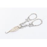 A pair of Victorian silver grape scissors, chased and fretted handles, Birmingham 1890, 1.