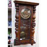 A 19th century walnut Vienna wall clock, having an eight day movement, chapter dial, the frame a/f,