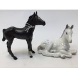 A Beswick late 1950/60s black racehorse foal,