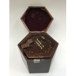 A 48 key 'squeeze box' concertina, 19th century, no makers name, mahogany casing, fretwork,