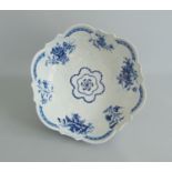 A Worcester Blue and White Salad or Junket Dish Painted with flowers on a moulded body Circa