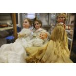 Three assorted bisque head vintage dolls, including one Armand Marseille,