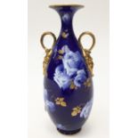 A Royal Doulton 'Rose', pattern on cobalt ground, twin handled vase Rd.