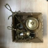 A quantity of brassware to include a companion set, kettles,