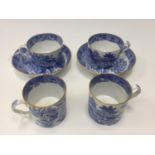 Two Spode blue and white trios, circa 1820, comprising tea cups,