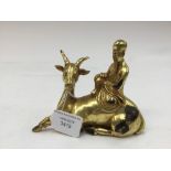 A gilt Chinese bronze Elder sitting on Impala