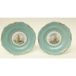 W E J Dean for Royal Crown Derby, a pair of Marine painted dessert plates, ships in sail,