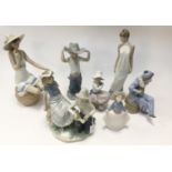 A collection of seven Nao figurines,