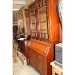 A late Victorian walnut bureau bookcase, circa 1890,