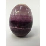 A 19th Century specimen of Blue John, carved to form an egg, height 4.