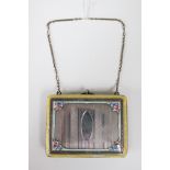 A French white metal and enamel compact, early 20th Century, in the form of a ladies purse,