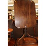 A George III mahogany tilt-top table,