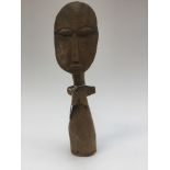 An African tribal carved wood Akua Ba' fertility doll figure, probably the Ashanti, Ghana,