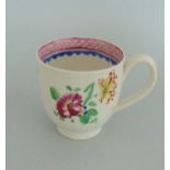 A Newhall Polychrome Coffee Cup .