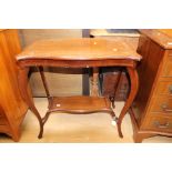 An Edwardian mahogany occasional table, of two-tier form,