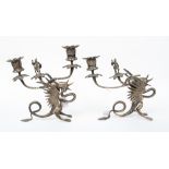 A pair of candlesticks depicting George and the Dragon (the Dragon with peach in mouth) (Oriental