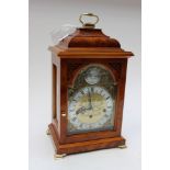 Comitti burr walnut mantle clock, silvered dial, Roman numerals, key, instructions, etc,