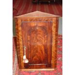 A 19th Century mahogany hanging corner cupboard