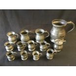 A group of approx sixteen pewter baluster tankards and measures (one box)