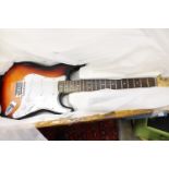 A Fender Stratocaster, six string electric guitar, with volume and tune controls, approx 98cms long,
