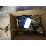 A box of mixed brasswares