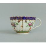 A Worcester Polychrome Reeded Tea Cup ,
