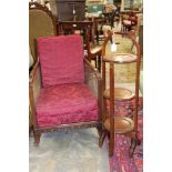 A 1920s Bergere armchair and a folding cake stand (2)