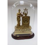 A French gilt bronze circa 1860/1880 striking clock with classical figure playing lyre,