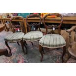 A part set of three Victorian walnut balloon back chairs,