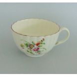 A Worcester Polychrome Fluted Body Tea Cup. Decorated with fine floral sprays. Circa 1770 Size 7.