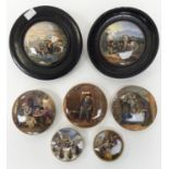 A group of seven Prattware pot lids of which two are framed