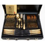 A Bestecke Solingen canteen of gold plated cutlery,