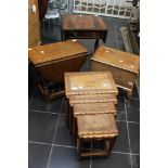 A collection of furniture, comprising a nest of four table, an Anglo Indian sewing box,