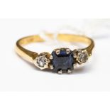 An 18ct gold sapphire and diamond ring,