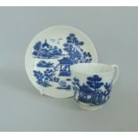 A Worcester Blue and White Coffee Cup and Saucer 'Man in a Pavilion ' Pattern Circa