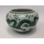 A Chinese globular bowl with green five clawed dragon,