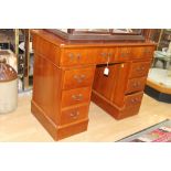 A reproduction pedestal desk, with two long drawers,