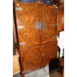 A Georgian style walnut cocktail cabinet